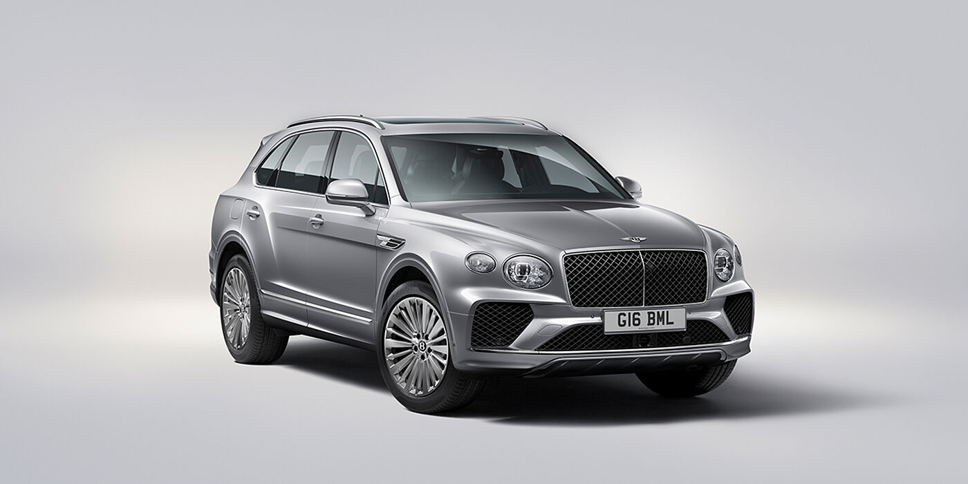 Bentley High Wycombe Bentley Bentayga luxury SUV front three quarter view in Moonbeam paint with matrix grille and 21″ 5 spoke painted wheels